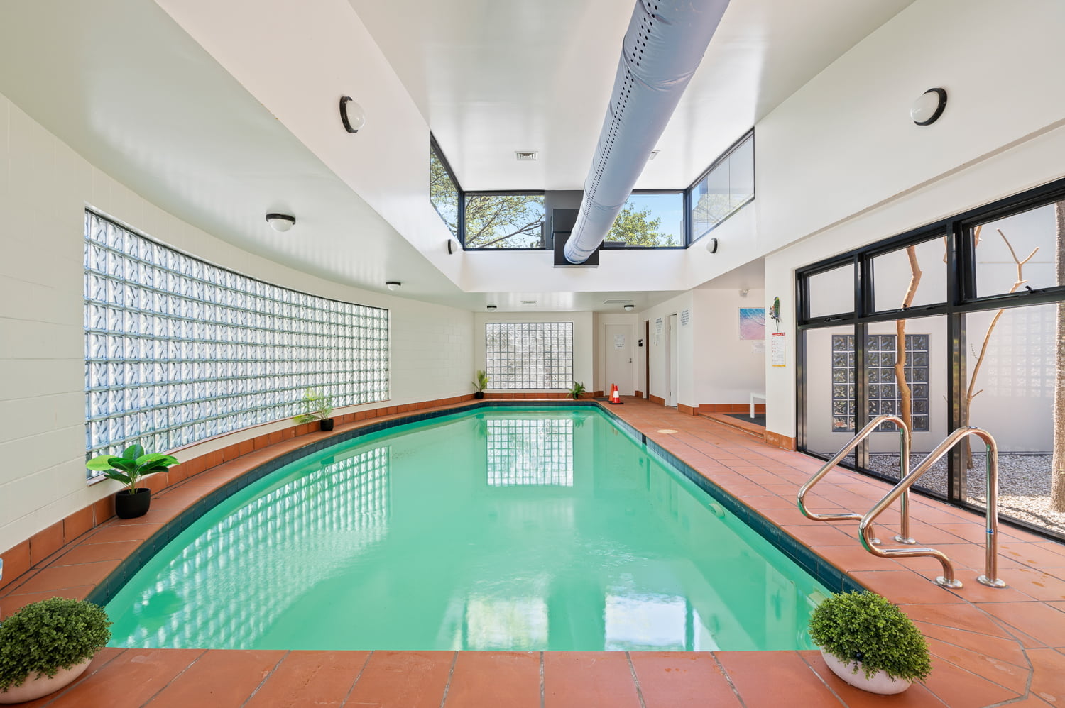 The pool with the apartment complex at 3/646 Sandy Bay Road SANDY BAY